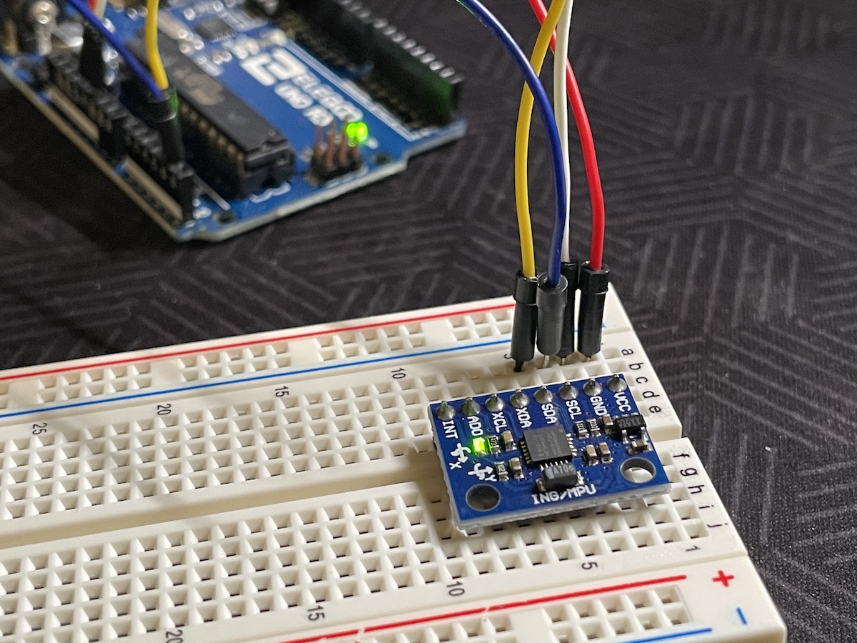 GY-521 accelerometer mounted on a breadboard with Arduino reading live data